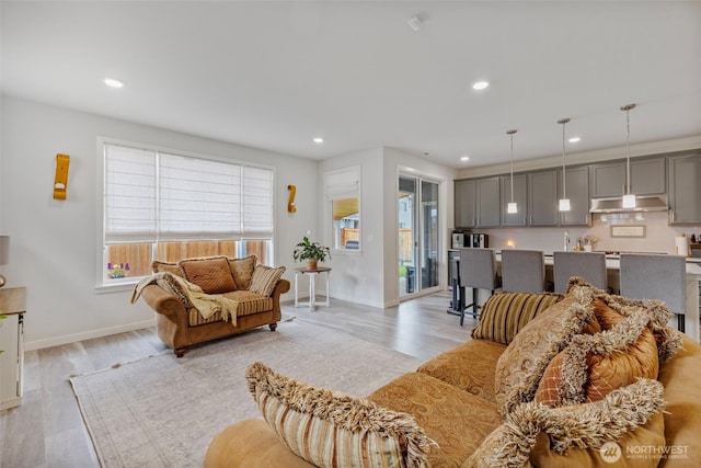 18230 134th Ave E, Puyallup, WA 98374 - living area featuring light wood-type flooring, recessed lighting, and baseboards