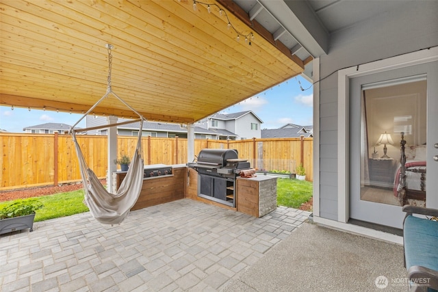 18230 134th Ave E, Puyallup, WA 98374 - fenced backyard featuring a patio area