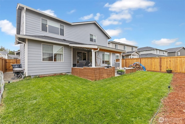 18230 134th Ave E, Puyallup, WA 98374 - back of property featuring a patio area, roof with shingles, and an outdoor living space