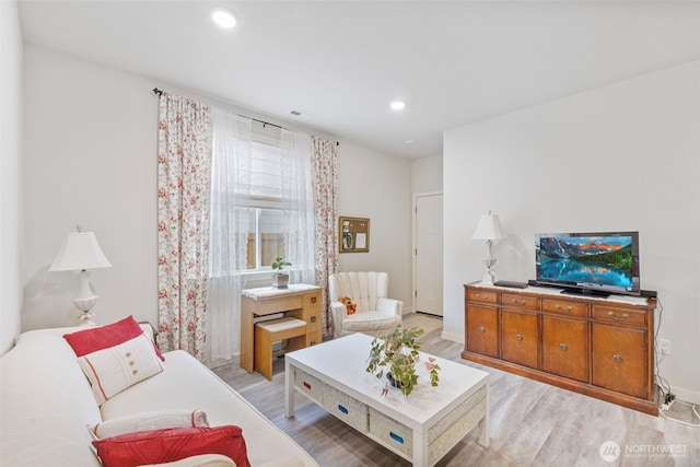 18230 134th Ave E, Puyallup, WA 98374 - living room featuring light wood finished floors, baseboards, and recessed lighting