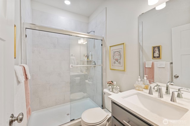 18230 134th Ave E, Puyallup, WA 98374 - bathroom featuring toilet, vanity, and a stall shower