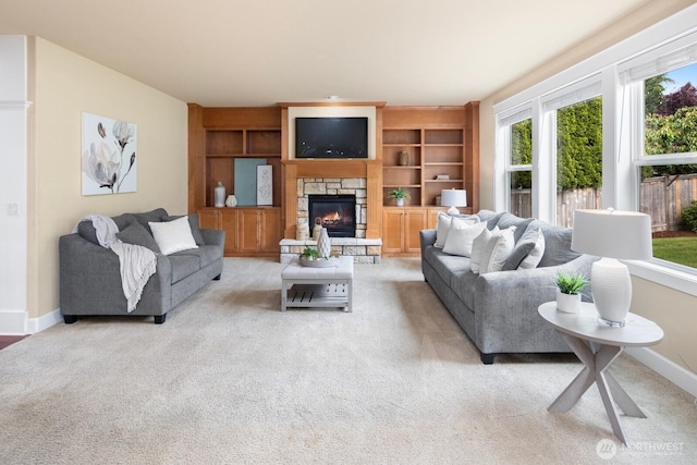 21515 26th St E, Lake Tapps, WA 98391 - living room featuring a fireplace, baseboards, light carpet, and built in features