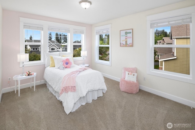 21515 26th St E, Lake Tapps, WA 98391 - bedroom with multiple windows, baseboards, and carpet