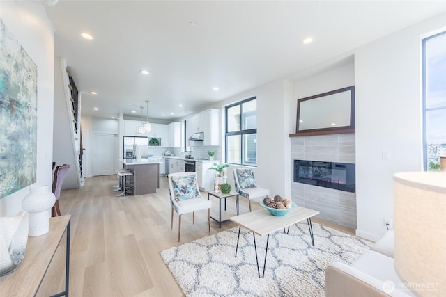 1019 Sturgus Ave S Unit A, Seattle, WA 98144 - living room with light wood-style floors, recessed lighting, and a fireplace