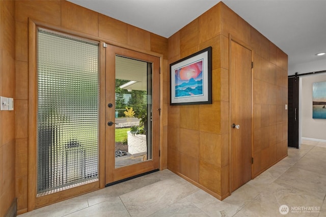 1505 E Horizon Dr, Mukilteo, WA 98275 - doorway to outside with a barn door and light tile patterned floors