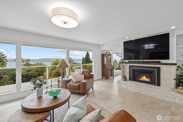 1505 E Horizon Dr, Mukilteo, WA 98275 - living area with a glass covered fireplace, recessed lighting, and baseboards