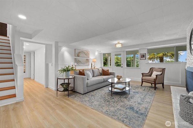 1505 E Horizon Dr, Mukilteo, WA 98275 - living area with stairway, light wood finished floors, and baseboards