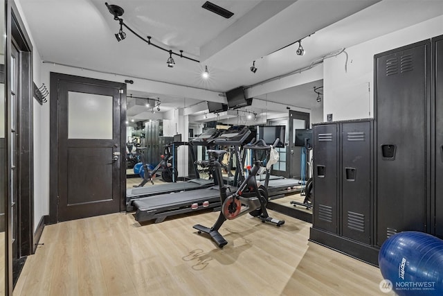 1505 E Horizon Dr, Mukilteo, WA 98275 - exercise room featuring wood finished floors and rail lighting