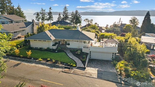 1505 E Horizon Dr, Mukilteo, WA 98275 - view of front of home featuring driveway, a water view, a residential view, and a front lawn