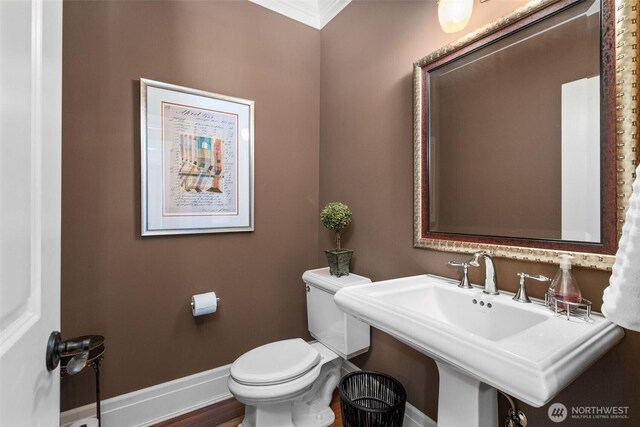 2920 39th Ln NW, Olympia, WA 98502 - bathroom with baseboards, a sink, and toilet