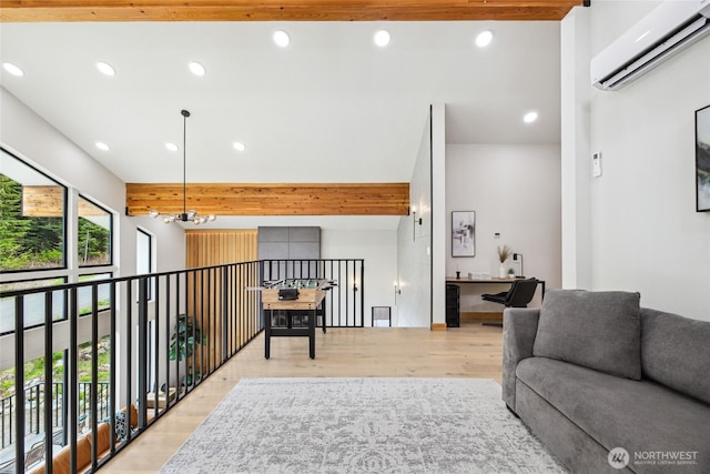 400 Hyak Dr E, Snoqualmie Pass, WA 98068 - living area featuring an AC wall unit, recessed lighting, light wood-type flooring, beamed ceiling, and a chandelier