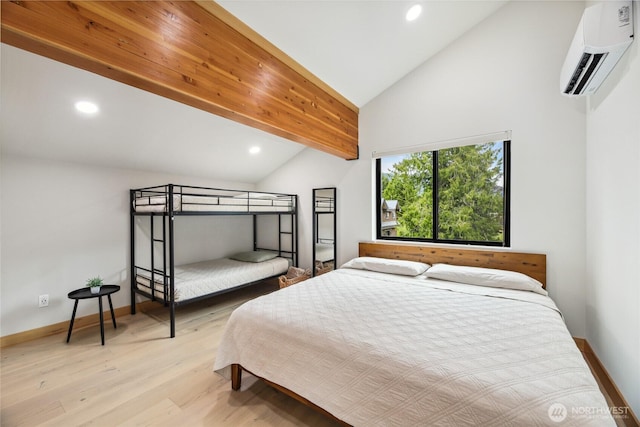 400 Hyak Dr E, Snoqualmie Pass, WA 98068 - bedroom with a wall mounted air conditioner, recessed lighting, light wood-style flooring, baseboards, and high vaulted ceiling