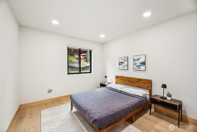 400 Hyak Dr E, Snoqualmie Pass, WA 98068 - bedroom with wood finished floors, baseboards, and recessed lighting