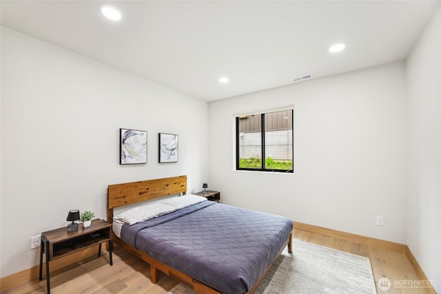 400 Hyak Dr E, Snoqualmie Pass, WA 98068 - bedroom featuring wood finished floors, baseboards, and recessed lighting