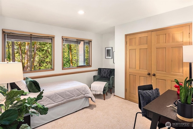 6160 W Mercer Way, Mercer Island, WA 98040 - carpeted bedroom with multiple windows, recessed lighting, and a closet