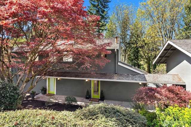 6160 W Mercer Way, Mercer Island, WA 98040 - view of front of home featuring a chimney