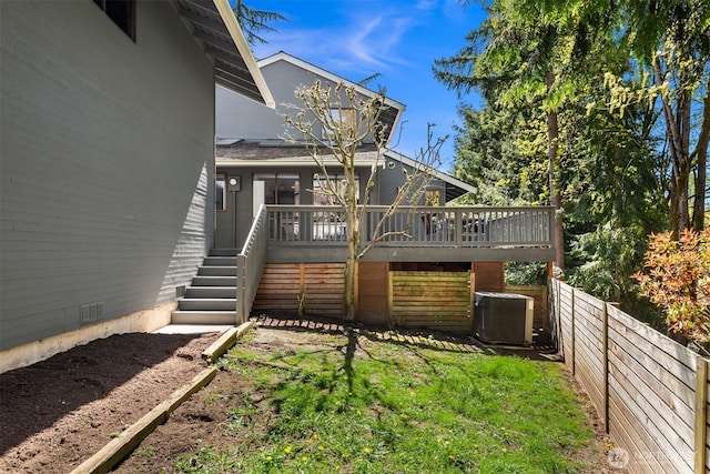 6160 W Mercer Way, Mercer Island, WA 98040 - back of property with central AC unit, stairs, and a wooden deck