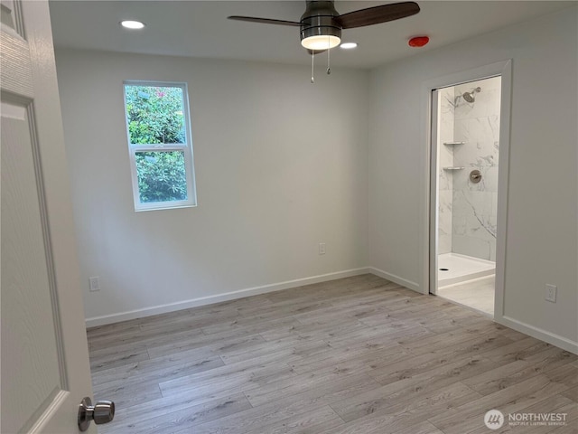 unfurnished bedroom featuring light wood finished floors, recessed lighting, baseboards, and ensuite bathroom