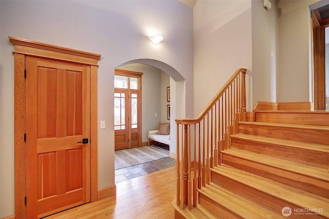 23623 20th Ave W, Bothell, WA 98021 - foyer with arched walkways, stairs, and wood finished floors