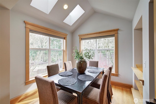 23623 20th Ave W, Bothell, WA 98021 - dining space with a skylight, light wood finished floors, and lofted ceiling