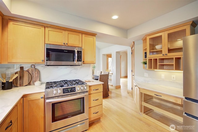 23623 20th Ave W, Bothell, WA 98021 - kitchen with stainless steel appliances, light countertops, light wood-type flooring, decorative backsplash, and open shelves