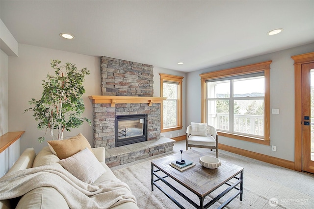 23623 20th Ave W, Bothell, WA 98021 - living area featuring a fireplace, baseboards, recessed lighting, and carpet flooring