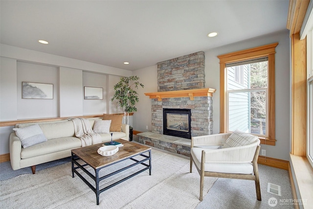 23623 20th Ave W, Bothell, WA 98021 - carpeted living area featuring a fireplace, baseboards, and recessed lighting
