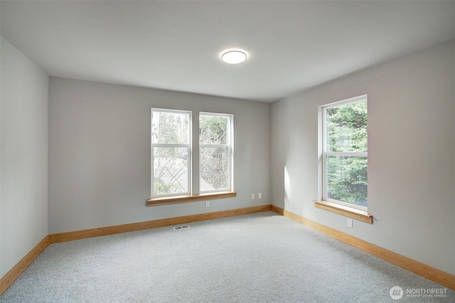 23623 20th Ave W, Bothell, WA 98021 - unfurnished room with plenty of natural light, carpet, and baseboards