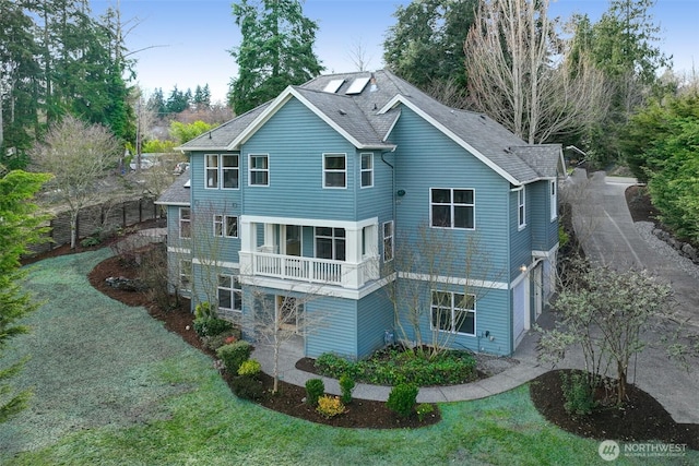 23623 20th Ave W, Bothell, WA 98021 - rear view of house with a lawn, a garage, and driveway