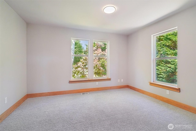 23623 20th Ave W, Bothell, WA 98021 - spare room with plenty of natural light and light colored carpet