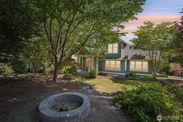 23623 20th Ave W, Bothell, WA 98021 - view of front facade featuring an outdoor fire pit and a shingled roof
