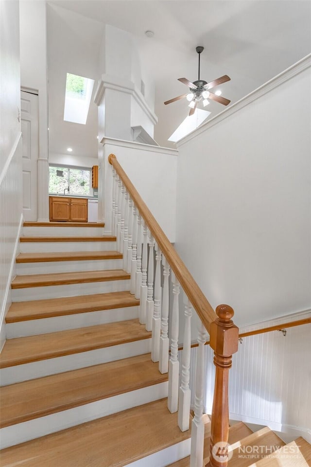 4 Alder Ct, Bellingham, WA 98229 - stairs featuring a towering ceiling, a skylight, and ceiling fan