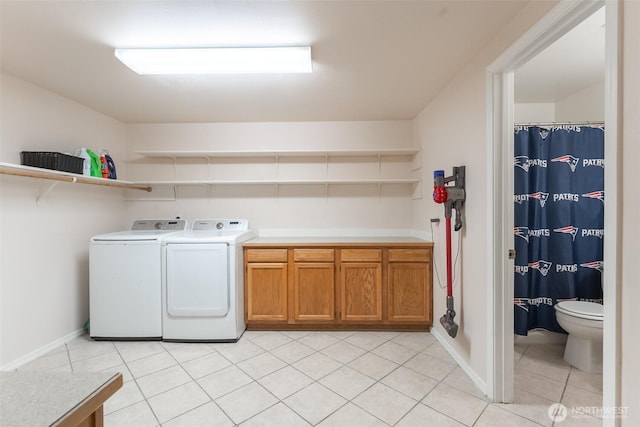 4 Alder Ct, Bellingham, WA 98229 - laundry area with washer and dryer, light tile patterned floors, and baseboards