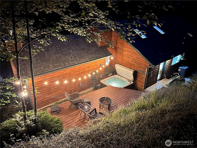 4 Alder Ct, Bellingham, WA 98229 - back of property featuring a wooden deck and central air condition unit