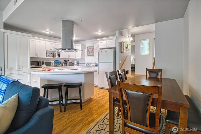 7806 Birch Bay Dr Unit 1007, Blaine, WA 98230 - dining area featuring light wood-style flooring