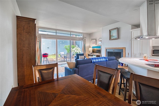 7806 Birch Bay Dr Unit 1007, Blaine, WA 98230 - dining space with a fireplace