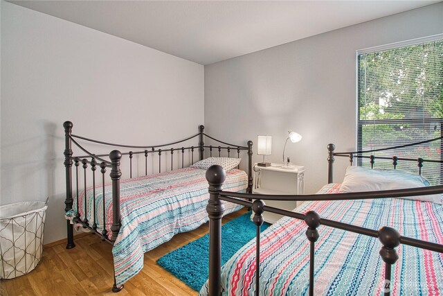 7806 Birch Bay Dr Unit 1007, Blaine, WA 98230 - bedroom with wood finished floors and baseboards