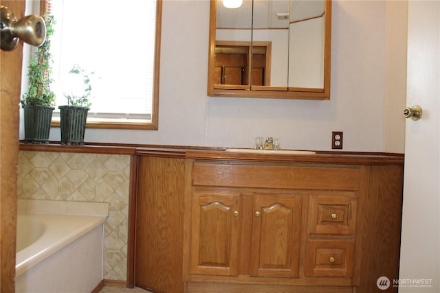 full bathroom with a sink and a bath