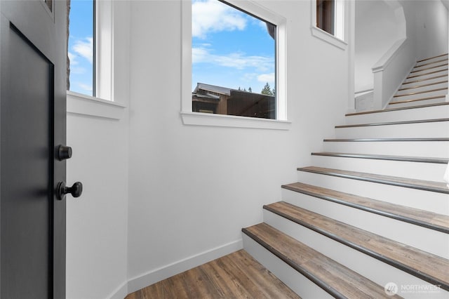 7409 Myers Rd, Bonney Lake, WA 98391 - stairway with baseboards and wood finished floors