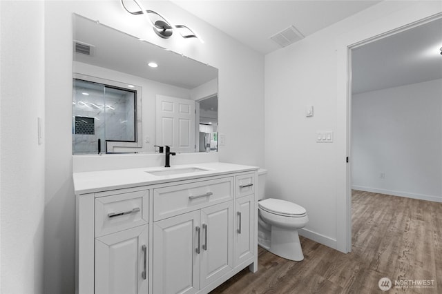7409 Myers Rd, Bonney Lake, WA 98391 - bathroom with vanity and wood finished floors