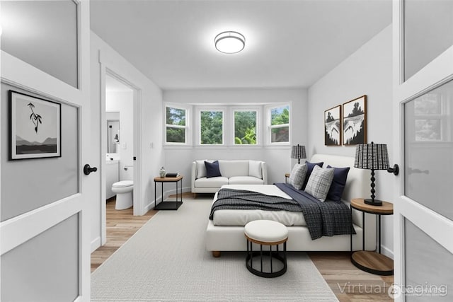 7409 Myers Rd, Bonney Lake, WA 98391 - bedroom featuring wood finished floors and ensuite bath