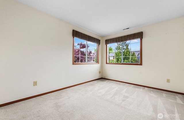 3238 NE 100th St Unit D, Seattle, WA 98125 - spare room with light carpet and baseboards