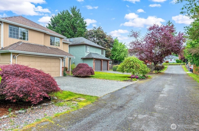 3238 NE 100th St Unit D, Seattle, WA 98125 - view of front of house with driveway and an attached garage