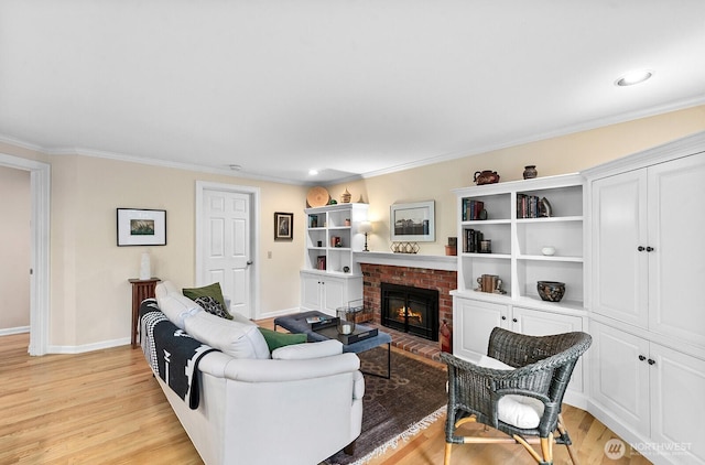 3238 NE 100th St Unit D, Seattle, WA 98125 - living room with light wood-style flooring, a fireplace, baseboards, ornamental molding, and recessed lighting