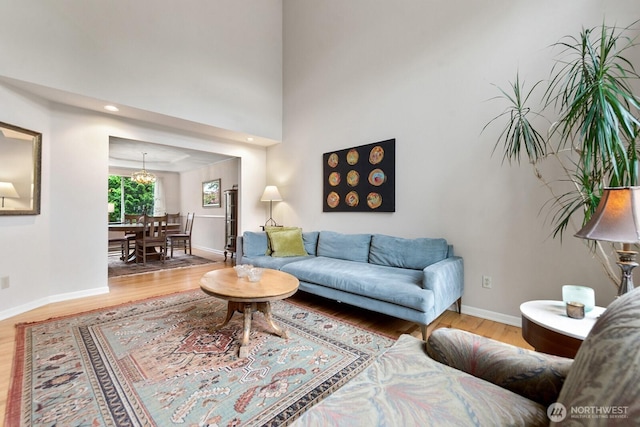 3238 NE 100th St Unit D, Seattle, WA 98125 - living area featuring wood finished floors, baseboards, and recessed lighting