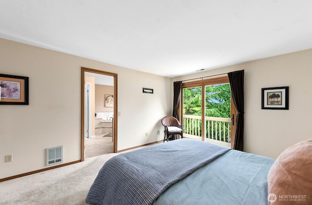 3238 NE 100th St Unit D, Seattle, WA 98125 - carpeted bedroom with baseboards, access to exterior, and connected bathroom