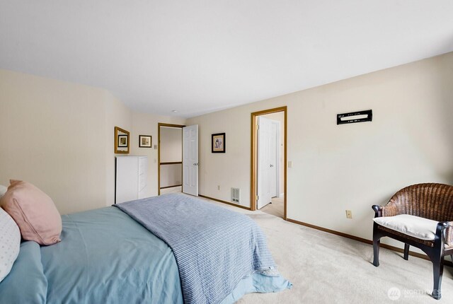 3238 NE 100th St Unit D, Seattle, WA 98125 - bedroom featuring light carpet and baseboards