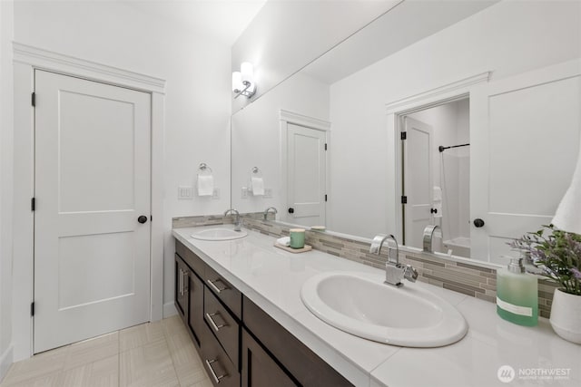 10815 NE 190th Pl, Bothell, WA 98011 - bathroom with double vanity, a shower, backsplash, and tile patterned floors