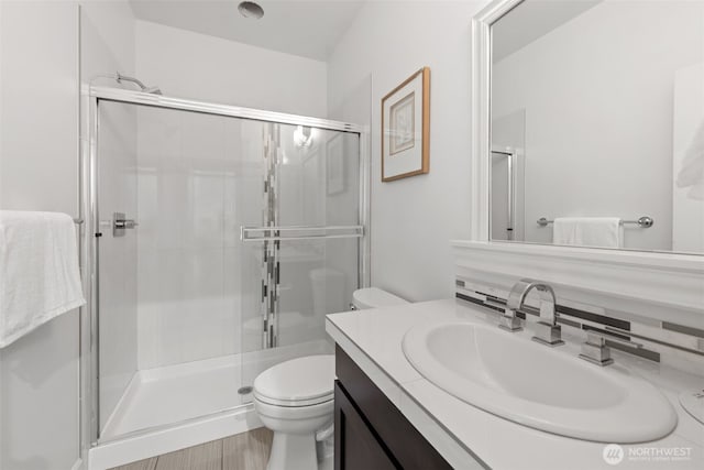 10815 NE 190th Pl, Bothell, WA 98011 - full bathroom with a shower stall, toilet, and vanity