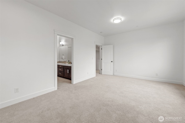 10815 NE 190th Pl, Bothell, WA 98011 - unfurnished bedroom featuring light carpet, baseboards, and ensuite bathroom